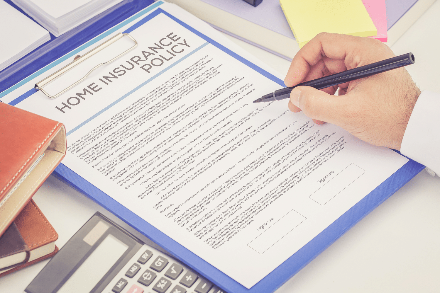 A person reviewing an insurance policy document