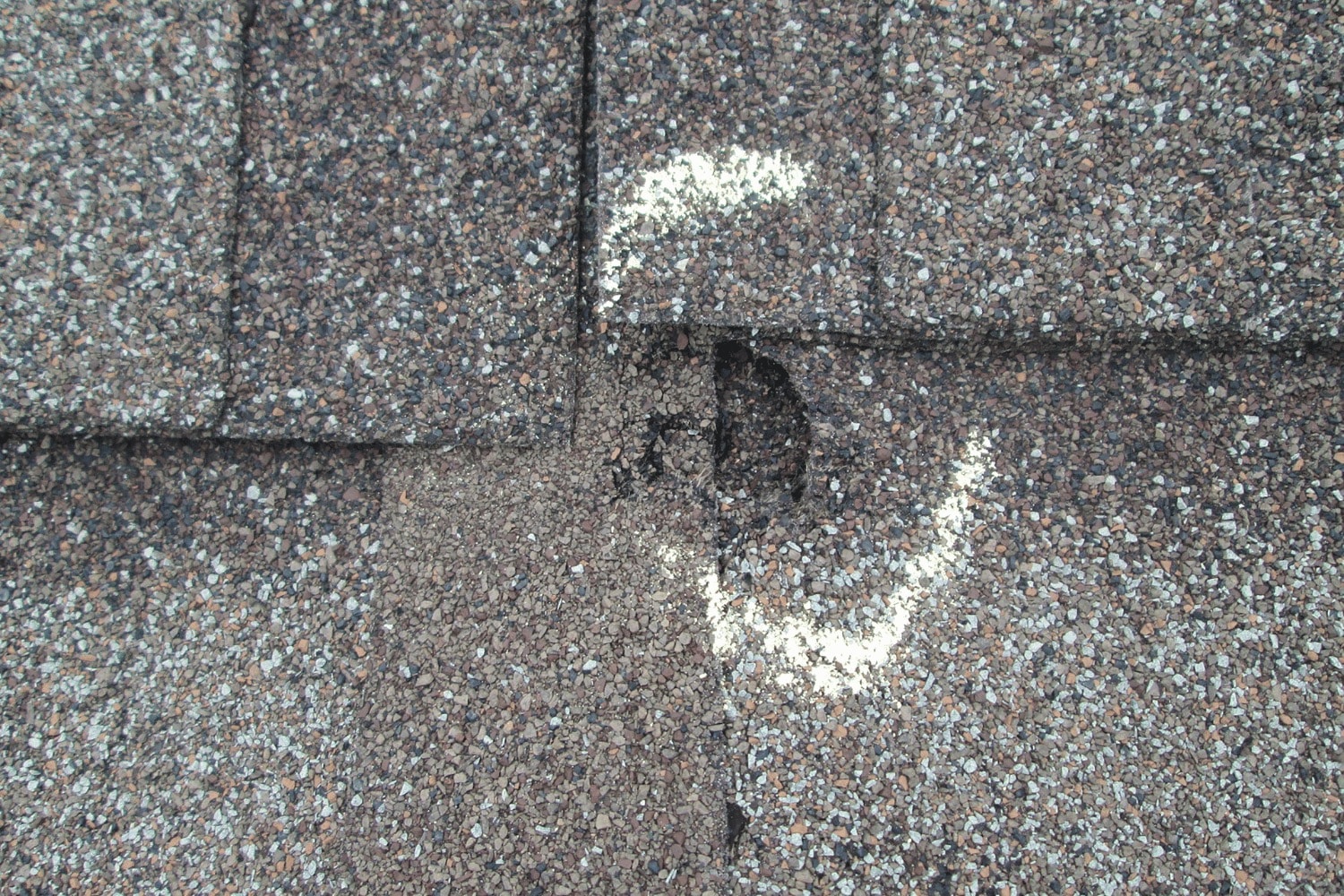 An illustration showing the process of repairing hail damage on a roof, featuring tools and materials.