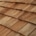 Wood shingles, specifically cedar shakes, displayed for roofing options.