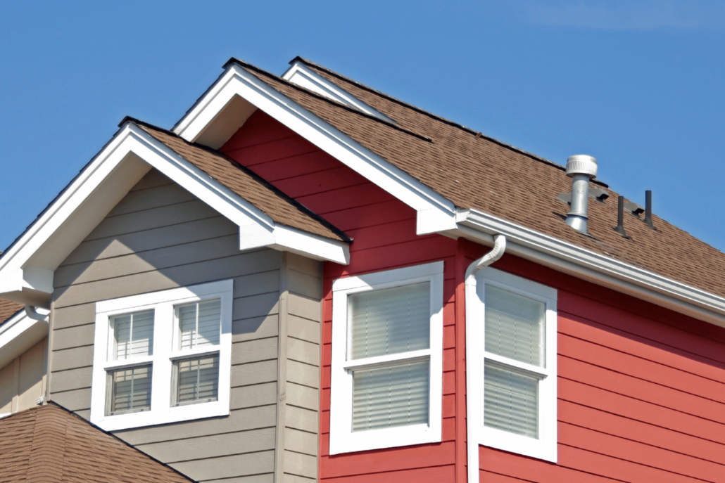 An illustration of a roofing contractor discussing options with a homeowner.