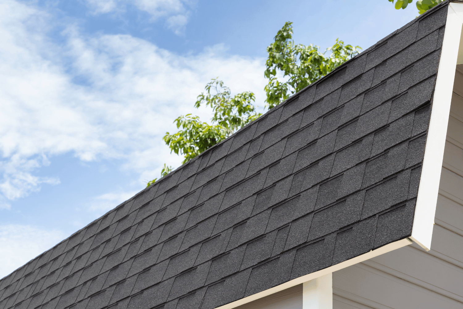 An illustration showing different home exterior elements matched with roof shingle colors. 