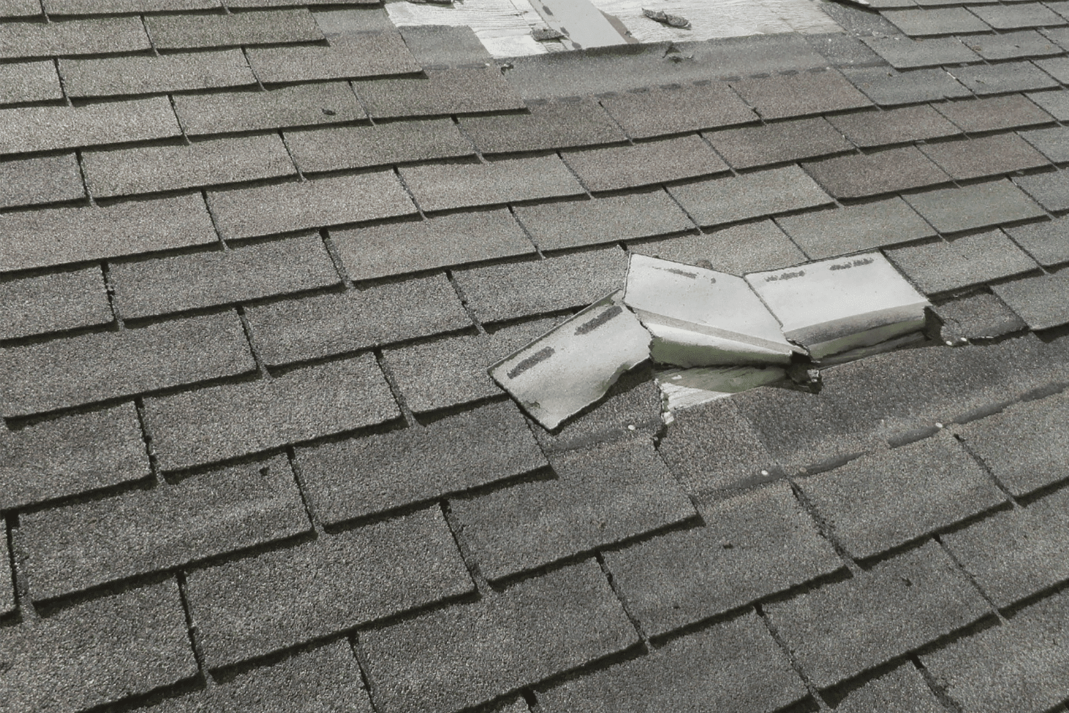 Signs that indicate a roof may need replacement, such as sagging and missing shingles.