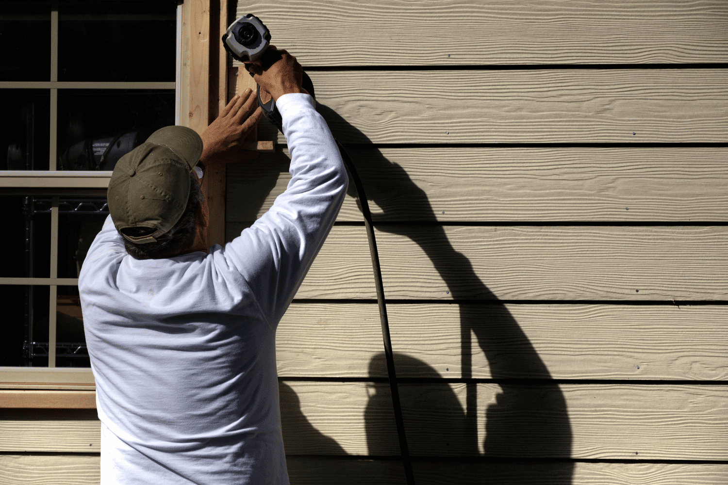 A house with new vinyl siding installation, highlighting the significance of siding as a priority in home renovation.