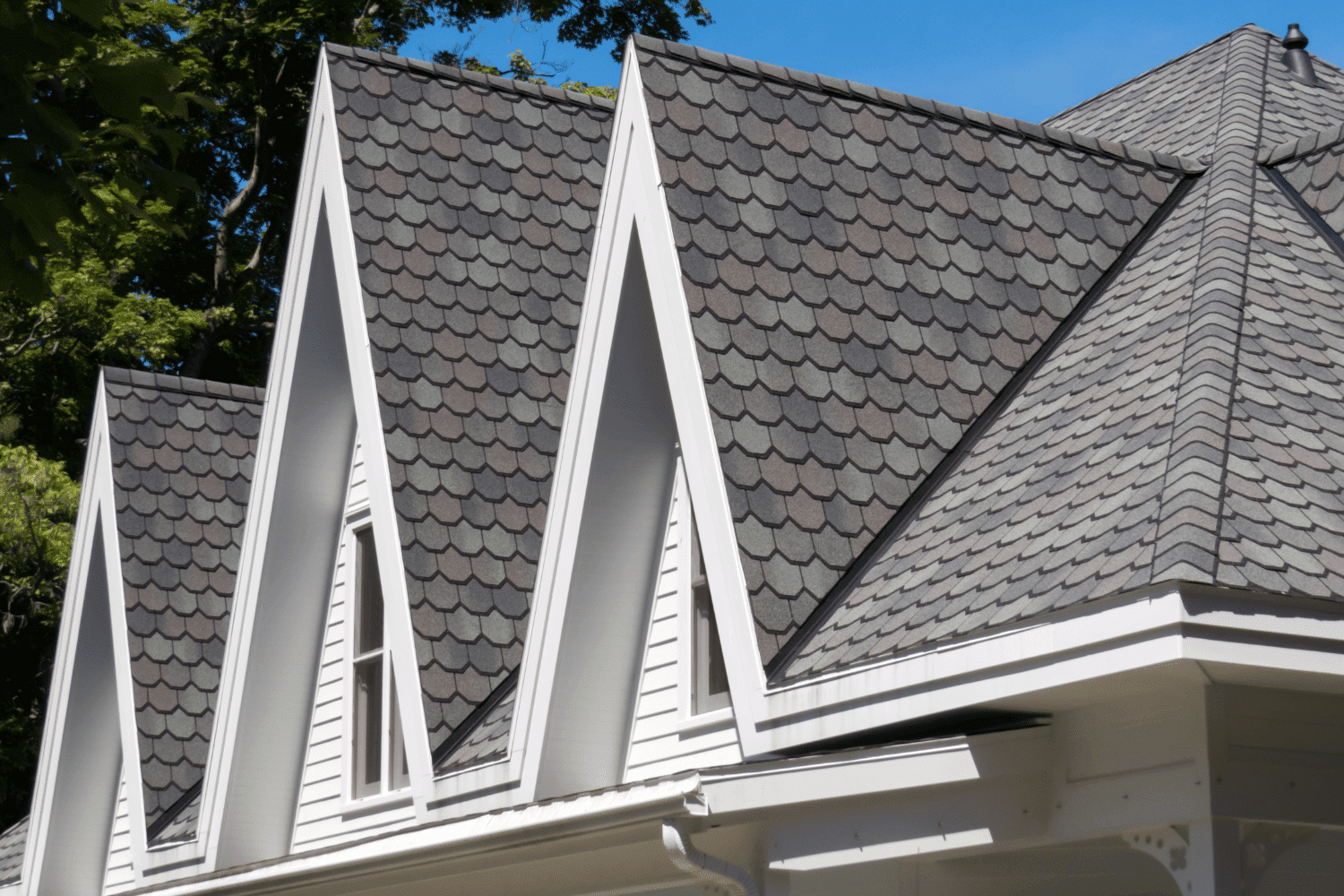 A comparison of different roofing materials including architectural shingles. 