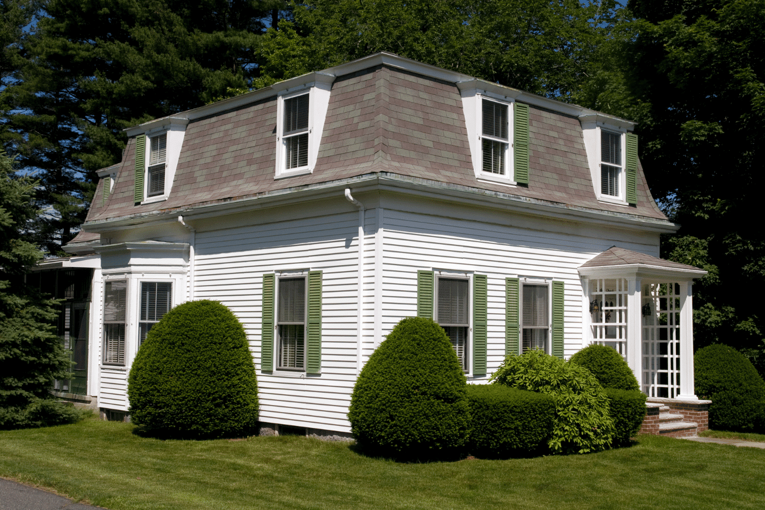 Mansard roofs showcasing their distinctive double slope design.